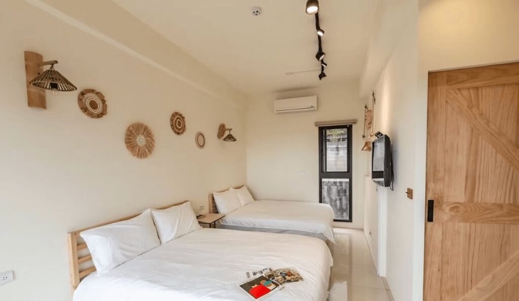 A minimalist room at Happy Sea Surf B&B, one of the best places to stay near Daxi, Taiwan