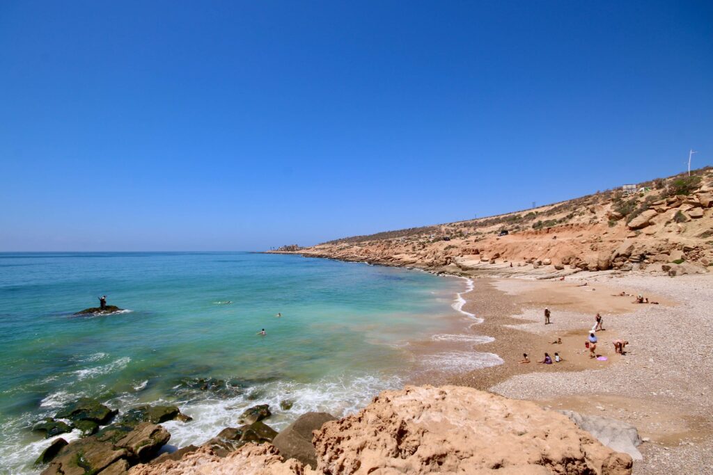 Best places to surf in Morocco: A pebbly beach near Tamraght