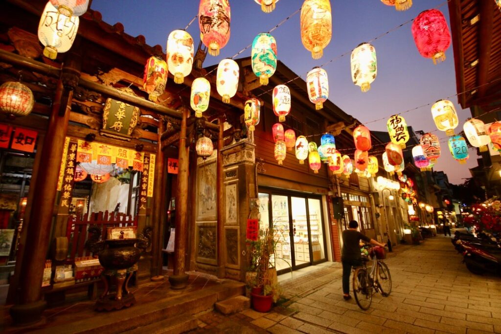 Off-the-beaten-path surfing in Taiwan: Red lanterns hang above a busy street