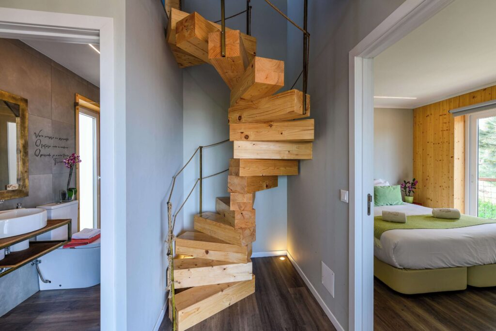 A spiral staircase in one of the eco houses at wecamp Reserva Alecrim