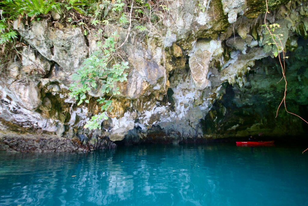 Kayaking inside Cathedral Cave in Nikko Bay